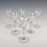 Six assorted 18th century wine glasses, each with a trumpet shaped bowl, raised on clear glass stems