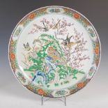 A Chinese porcelain famille verte charger, late Qing Dynasty, decorated with owl, other birds,