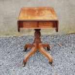 A George III mahogany drop leaf occasional table, the rounded rectangular top with twin drop
