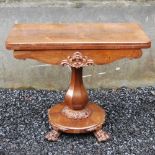 A 19th century rosewood pedestal card table, the hinged rectangular top opening to a green baize