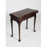 A George III mahogany concertina action tea and card table, the hinged triple top opening to a plain