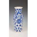 A Chinese porcelain blue and white hexagonal shaped vase, Qing Dynasty, decorated with flowers and