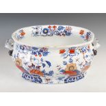 A 19th century Iron Stone China Japan pattern blue printed foot bath, the scroll handles with fish