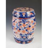 A Japanese Imari porcelain barrel shaped stool, late 19th/ early 20th century, decorated with shaped