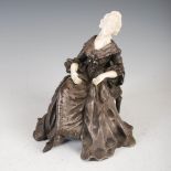 Xavier Raphanel, a late 19th/ early 20th century silvered bronze and ivory figure of a lady