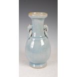 A Chinese porcelain crackle glazed pale blue ground vase, Qing Dynasty, the neck with ring