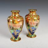 A pair of Wedgwood Fairyland lustre vases designed by Daisy Makeig-Jones, decorated in the Willow