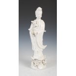 A Chinese porcelain blanc-de-chine figure of Guanyin, 20th century, 41.5cm high.