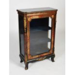 A 19th century ebonised and boulle work pier cabinet, the rounded rectangular top above a glazed