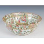 A Chinese porcelain famille rose Canton bowl, Qing Dynasty, decorated with panels of Court figures