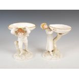 A pair of Royal Worcester comports modelled by James Hadley, dated 1884, modelled with young boy and
