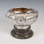 A Japanese silver presentation bowl, Konoike, Meiji Period, embossed with Iris, inscribed '