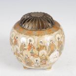 A Japanese Satsuma pottery koro and white metal cover, Meiji Period, decorated with elephant and