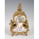 A late 19th/ early 20th century Viennese enamel and gilt metal miniature mantle clock, the