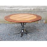 A mid 20th century Danish rosewood 'Flip-Flap' dining table by Dyrlund-Smith, circa 1960's, the