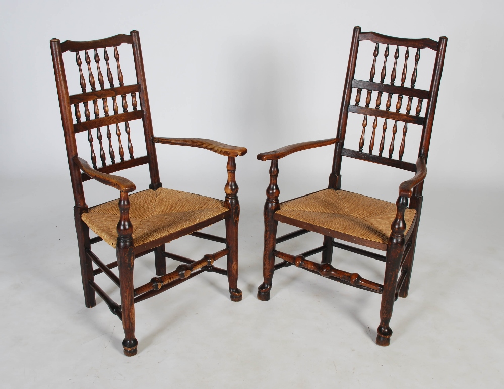 A set of eight 19th century ash Lancashire spindle back dining chairs, with woven rush seats,