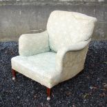 Attributed to Howard & Sons, a mahogany armchair, with original H & S ticking and loose cushion