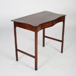 A 19th century George III style mahogany side table, the rectangular top with serpentine edge