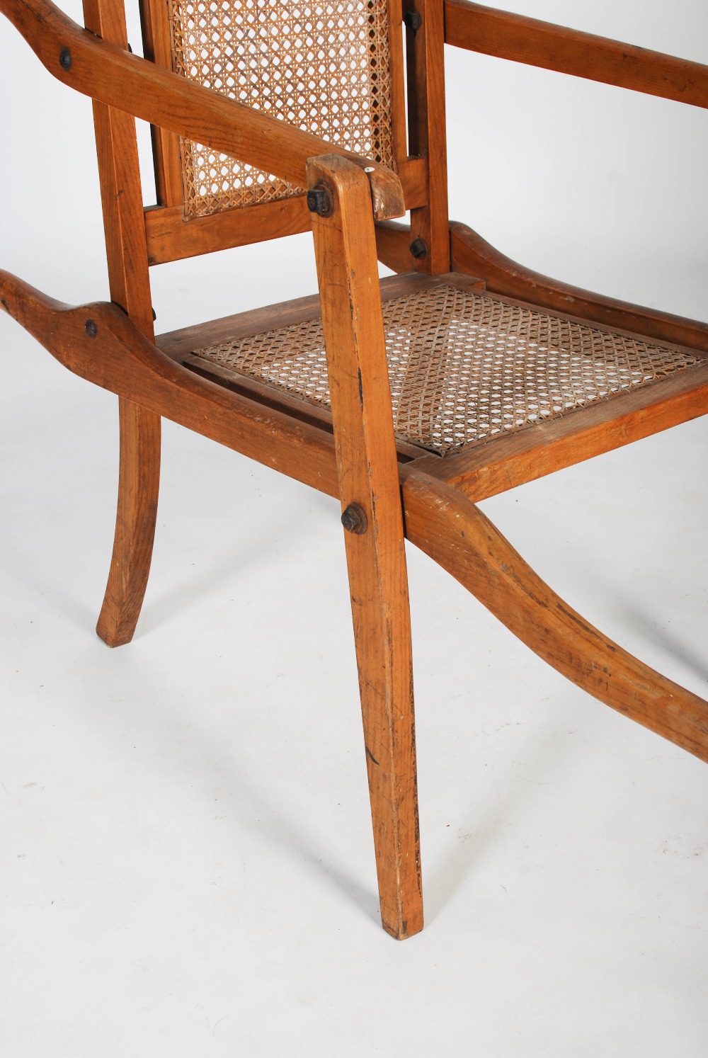 An early 20th century folding bathing chair, with cane work back and seat, the reverse inscribed ' - Image 2 of 6