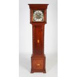 A late 19th/early 20th century mahogany longcase clock, the silvered dial and chapter ring with