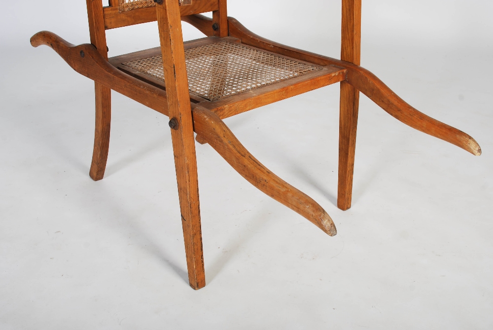 An early 20th century folding bathing chair, with cane work back and seat, the reverse inscribed ' - Image 3 of 6