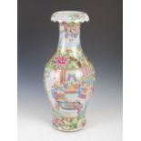 A Chinese porcelain famille rose Canton vase, Qing Dynasty, decorated with rectangular shaped panels