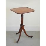 A George III mahogany and ebony lined snap top occasional table, the hinged octagonal top with a
