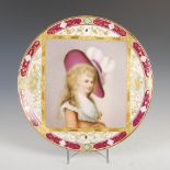 A Dresden porcelain cabinet plate decorated with a half length portrait of 'The Duches of