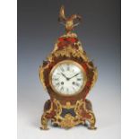 A 19th century Rococo style Boulle work and ormolu mounted mantle clock, with circular Arabic and