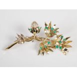 A mid 20th century yellow and white metal emerald and diamond spray brooch, set with thirteen