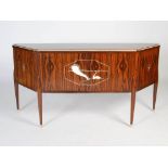 An Art Deco style Macassar ebony sideboard in the manner of Emile-Jacques Ruhlmann, fitted with a