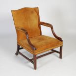 A George III mahogany Gainsborough armchair, with tan coloured leather upholstered back, arms and