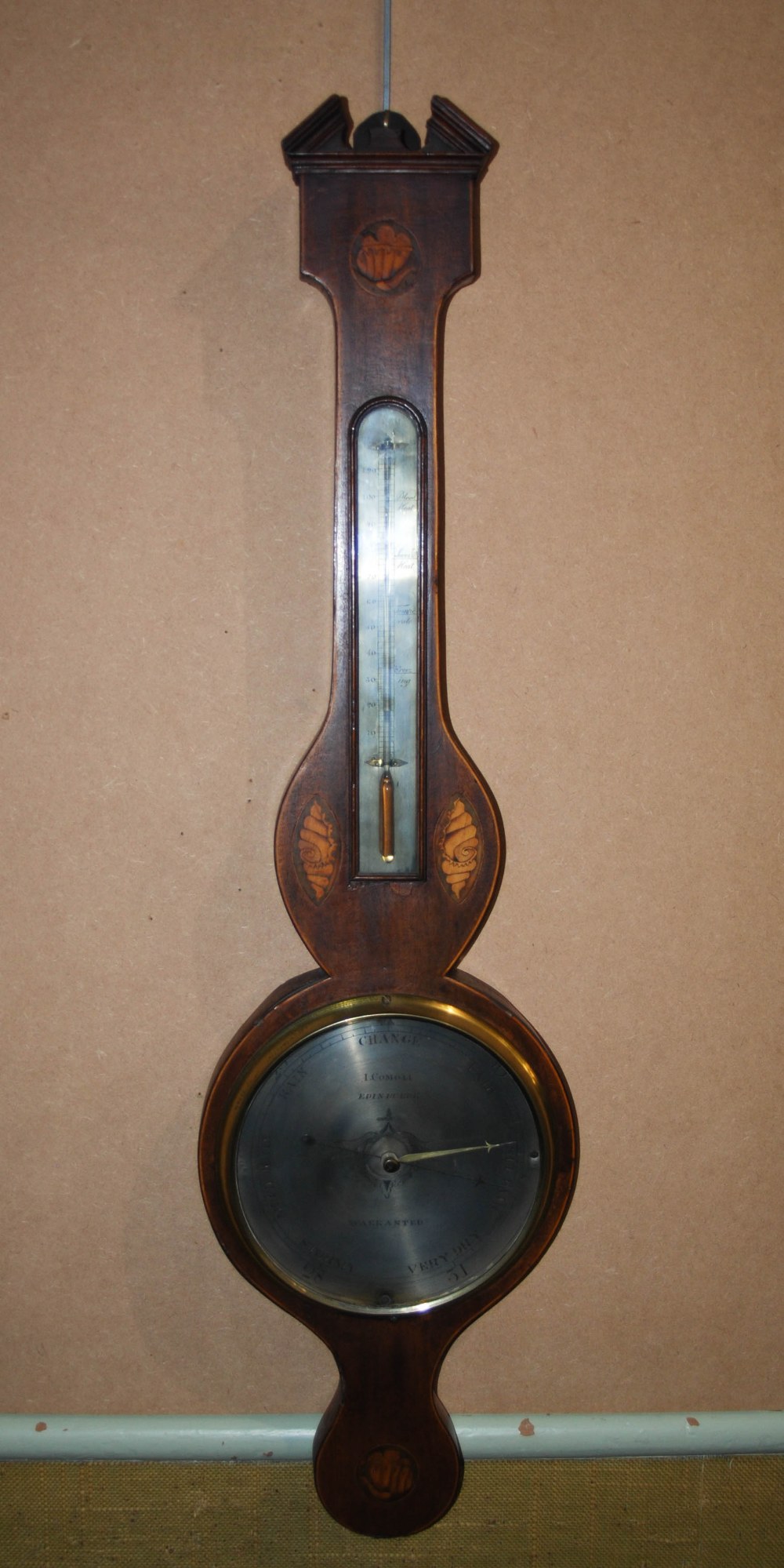 A 19th century mahogany and marquetry inlaid barometer, I. COMOLI, EDINBURGH, with silvered dials,