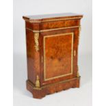 A 19th century walnut, marquetry and gilt metal mounted pier cabinet, the rectangular top with