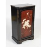 A late 19th century ebonised side cabinet with Japanese inlaid panel, the rectangular top with