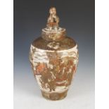 A Japanese Satsuma pottery jar and cover, Meiji Period, decorated with rectangular shaped panels