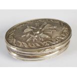 A 19th century Continental white metal oval snuff box, the hinged cover chased and embossed with a