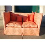 A 20th century knole drop end sofa, with loose cushions, 145cm wide x 86cm high x 83cm deep.