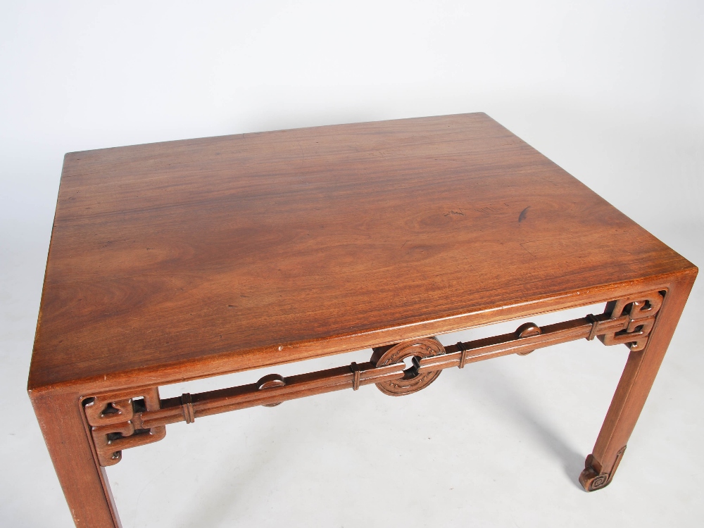 A Chinese huanghuali writing table, Qing Dynasty, the rectangular top above a pierced and scroll - Image 2 of 6