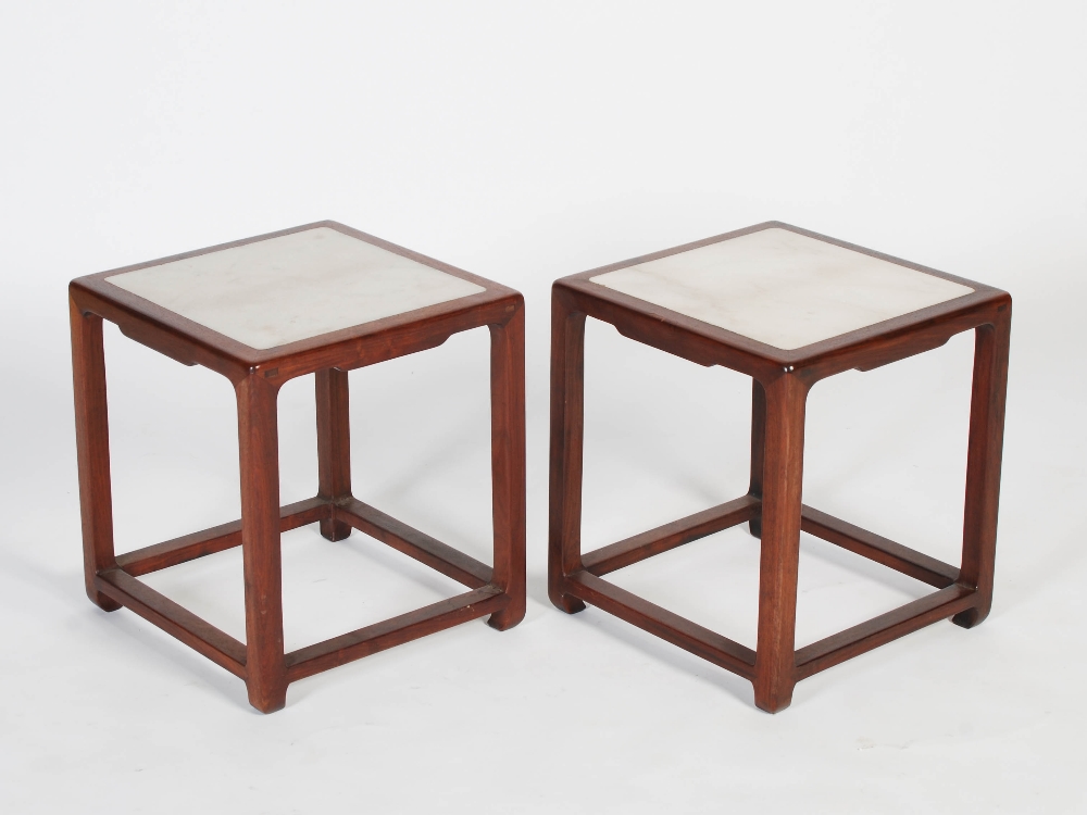 A pair of Chinese dark wood and marble square shaped jardiniere stands / occasional tables, late