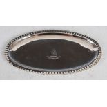 A George III silver oval shaped tray, London, 1784, makers mark of C.P, with crimped rim, engraved