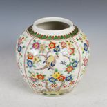 A decorative Chinese porcelain vase, 20th century, decorated with panels of prunus, birds and