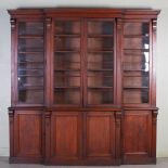 A 19th century oak breakfront bookcase, the moulded cornice above four astragal glazed cupboard