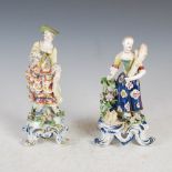 A pair of 18th century English porcelain figure groups, one modelled as a lady wearing wide
