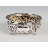 A Victorian silver bowl, Sheffield, 1891, makers mark of HA, embossed with flowers, foliage and