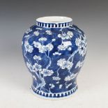 A Chinese porcelain blue and white jar, Qing Dynasty, decorated with prunus blossom on a cracked ice