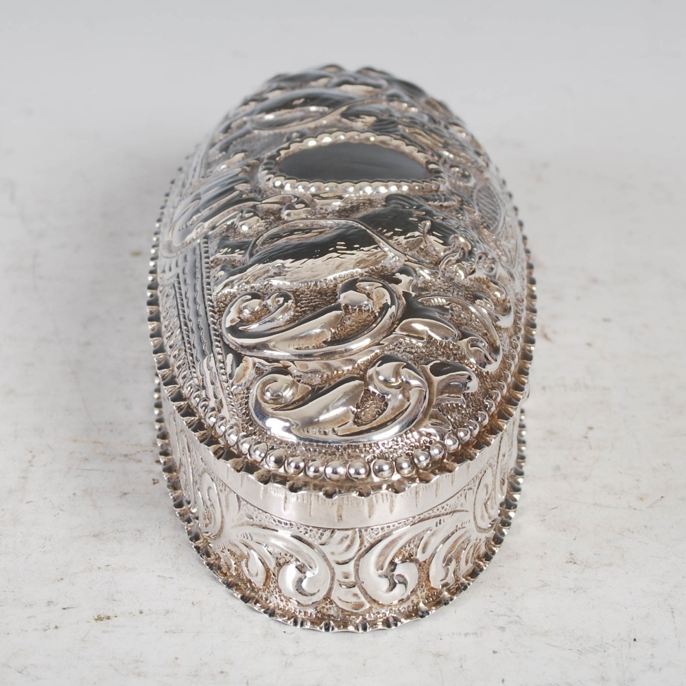 A Victorian silver oval shaped box and cover, Birmingham, 1891, makers mark of H&A, with embossed - Image 2 of 9