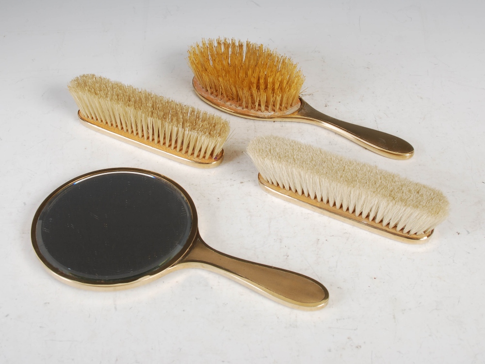 A 9ct gold four piece dressing table set, comprising; handheld mirror, single brush and pair of - Image 2 of 15