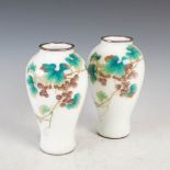 A pair of Japanese silver wirework white ground cloisonne vases, late 19th/early 20th century,