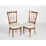 A set of six late 19th century mahogany dining chairs, the concave backs with three vertical